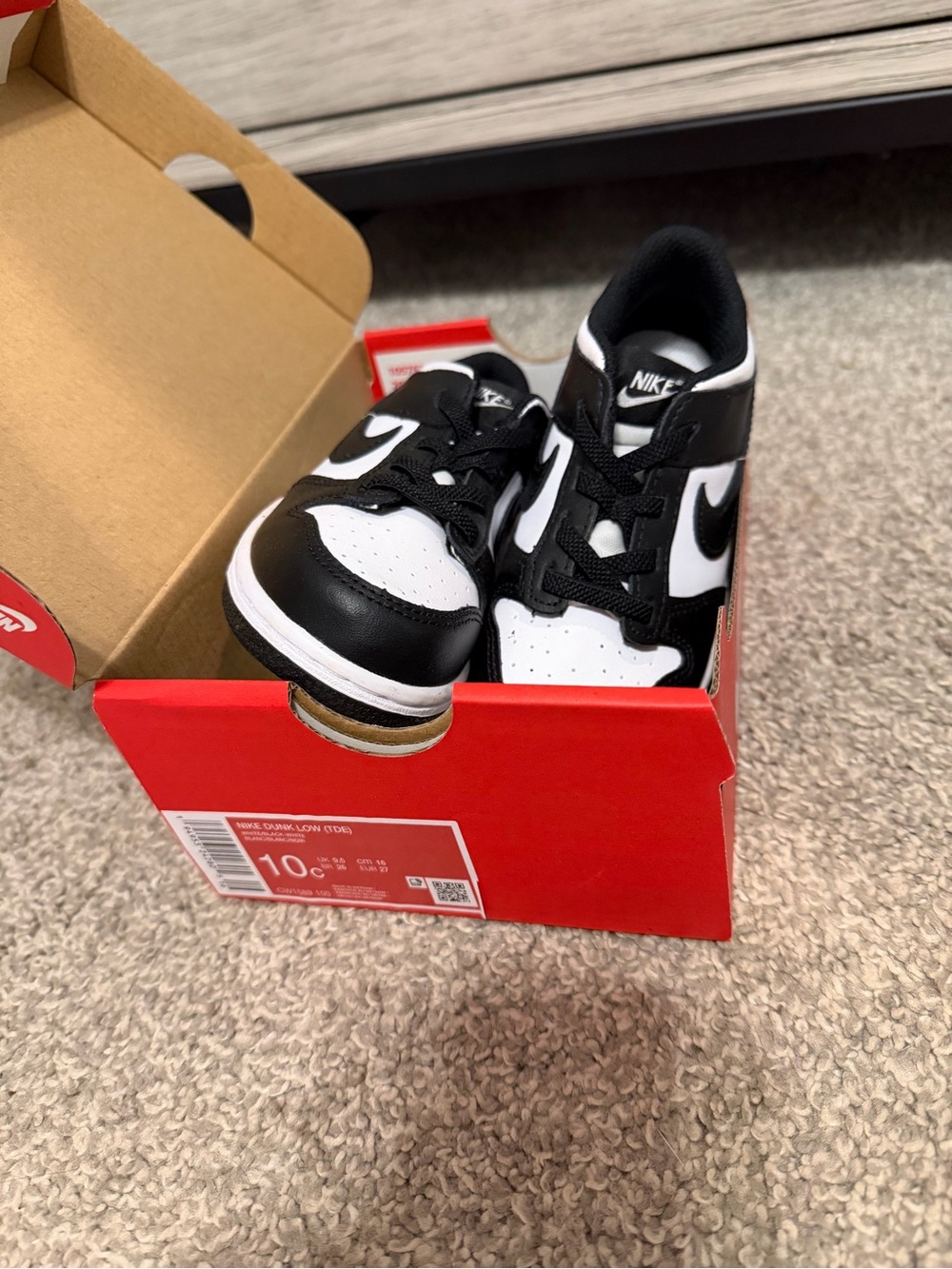 Boys size 10 Nike dunks Kids Black and White Low-Top Sneakers with Swoosh